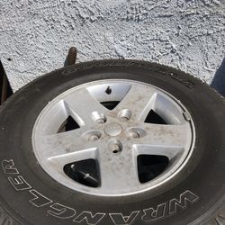 Jeep Goodyear Wrangler Tires and Stock Rims