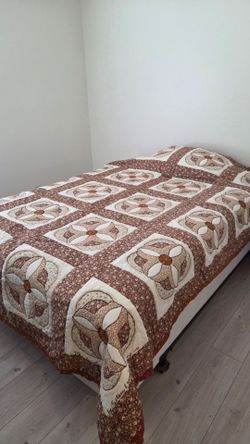Full size quilt earth tones