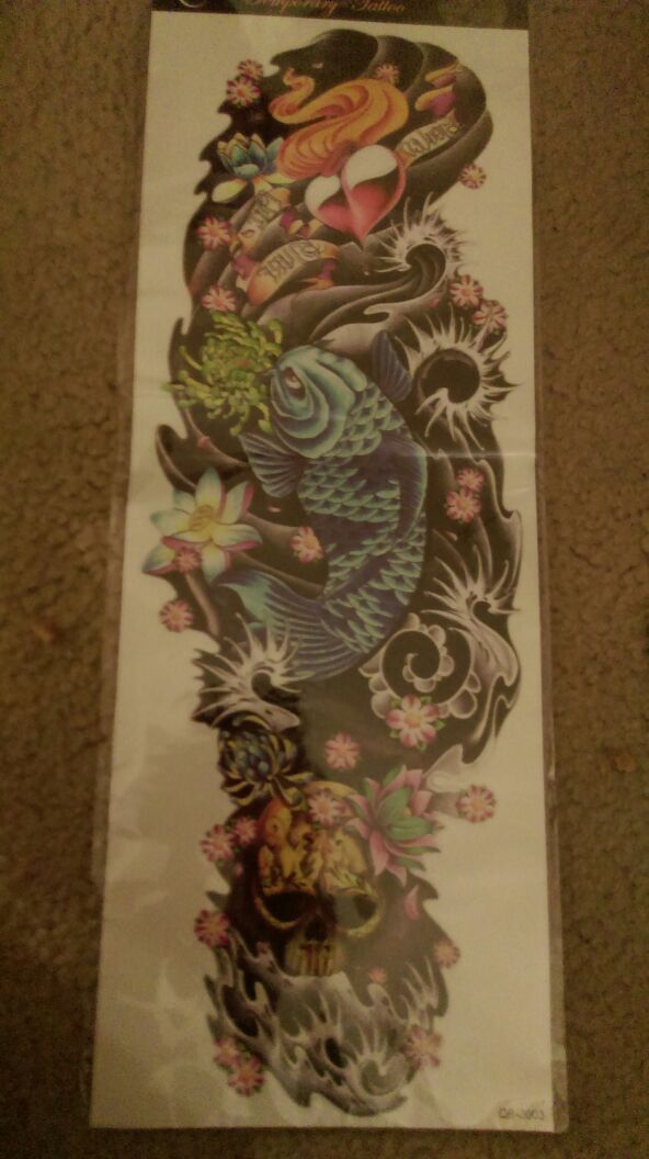 Huge sleeve tattoo fish