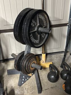 Olympic  weights and barbell with tower.