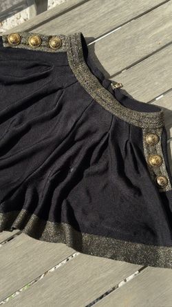 Balmain knit top with gold-tone buttons and metallic trim