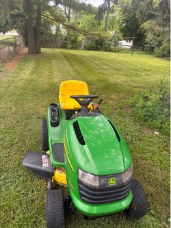 John Deere l100