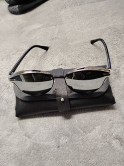 1 pair of silver mens sun glasses