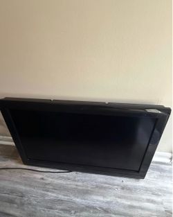Insignia TV w/ Remote and Roku Attachment Flat Screen TV Black
