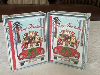 2 boxed sets of Molly & Rex dog-themed holiday greeting cards. 12 cards & envelopes per box.  $8/each.