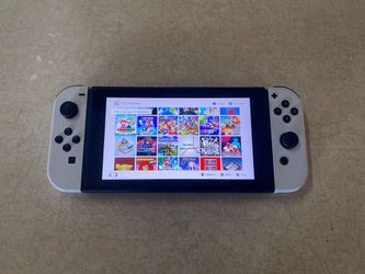 Nintendo Switch V2 and 7500 Games installed