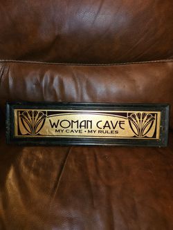 Woman cave sign