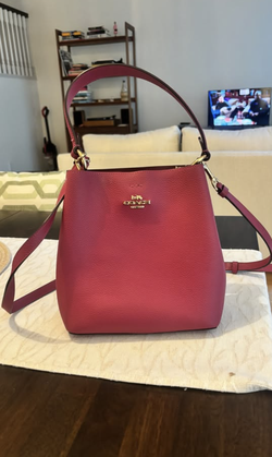 Pre-owned COACH "Mollie" dark pink bucket purse