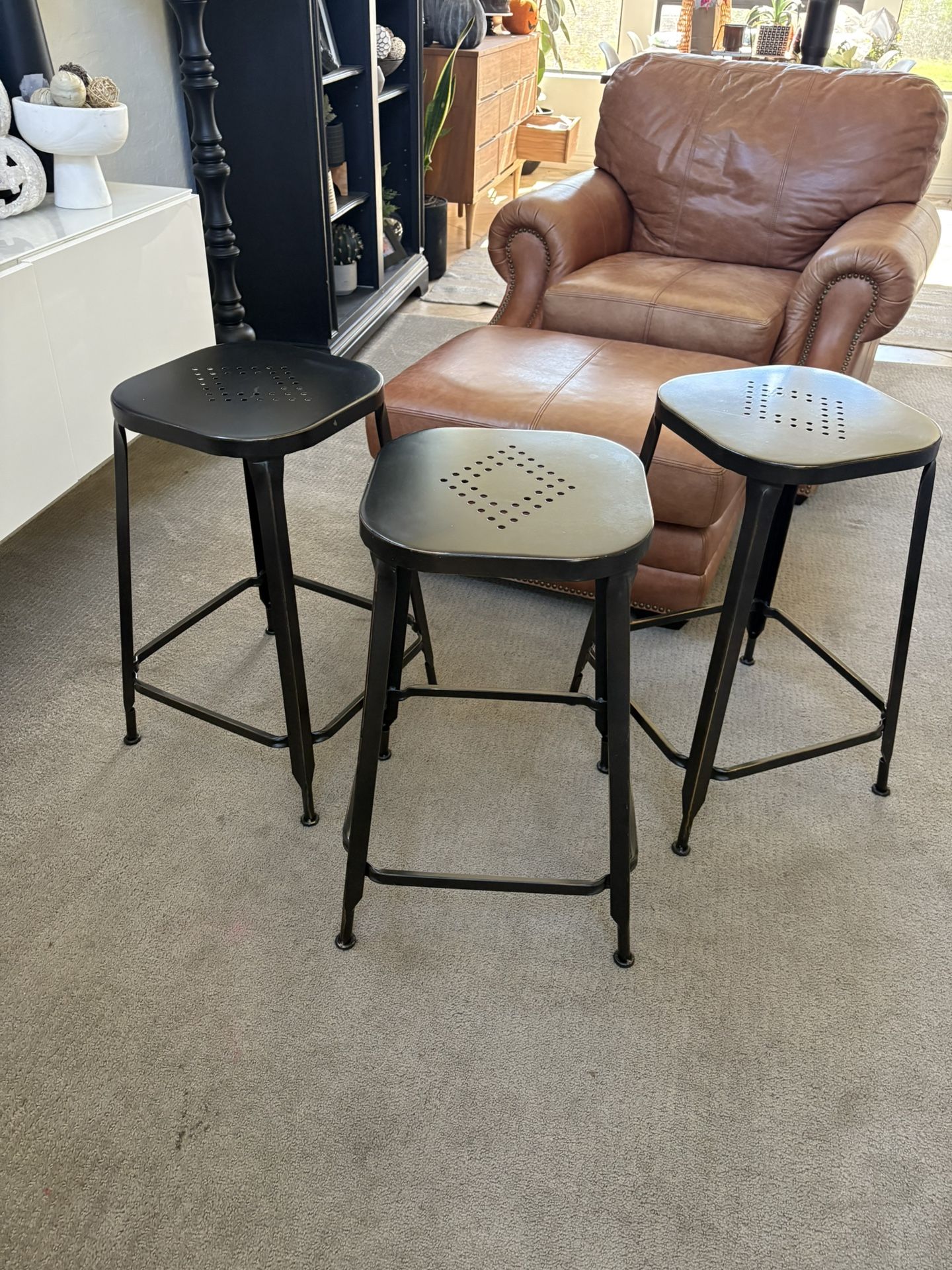 Pier 1 Bar Stools. Set of 3 black metal.