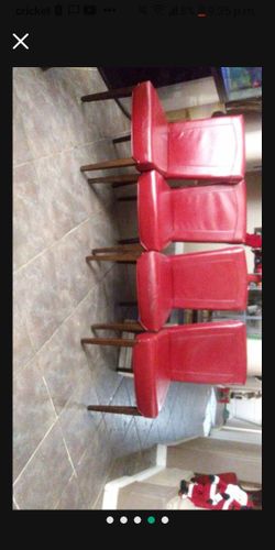 4 Dark Red Chairs Made Of Leather