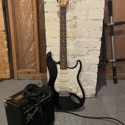 Electric Guitar With Amplifier