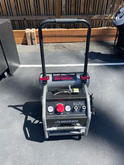 Husky 4.5 Gal. Portable/rolling silent air compressor (dual output) Like New