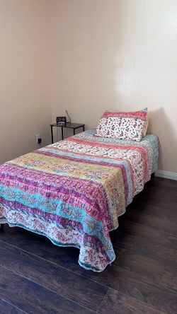 Wooden bed with new mattress