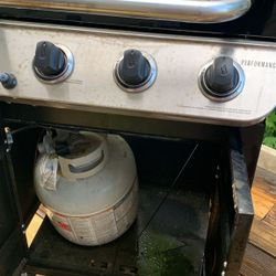 Used Grill With Half Full Propane Tank