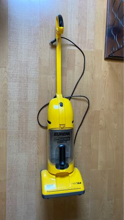 Bag less upright vacuum