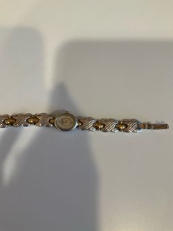 Gold and sterling silver bracelet watch