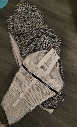 MOBY Baby Wrap Carrier, specifically a special edition collaboration with Petunia Pickle Bottom. 