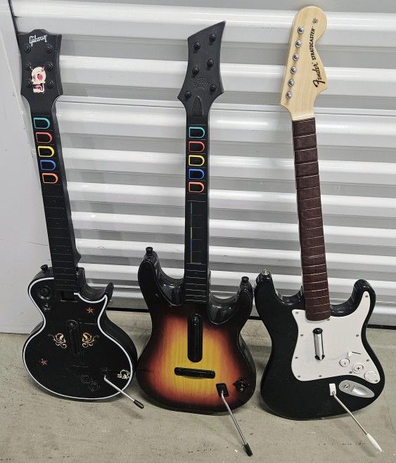 Lot of 3 Guitar Controllers: PS3 (Les Paul/World Tour) & Wii (Rock Band) - FOR PARTS / NO DONGLES