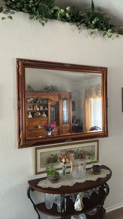 Large mirror in wooden frame