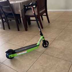 All green Razor little scooter 