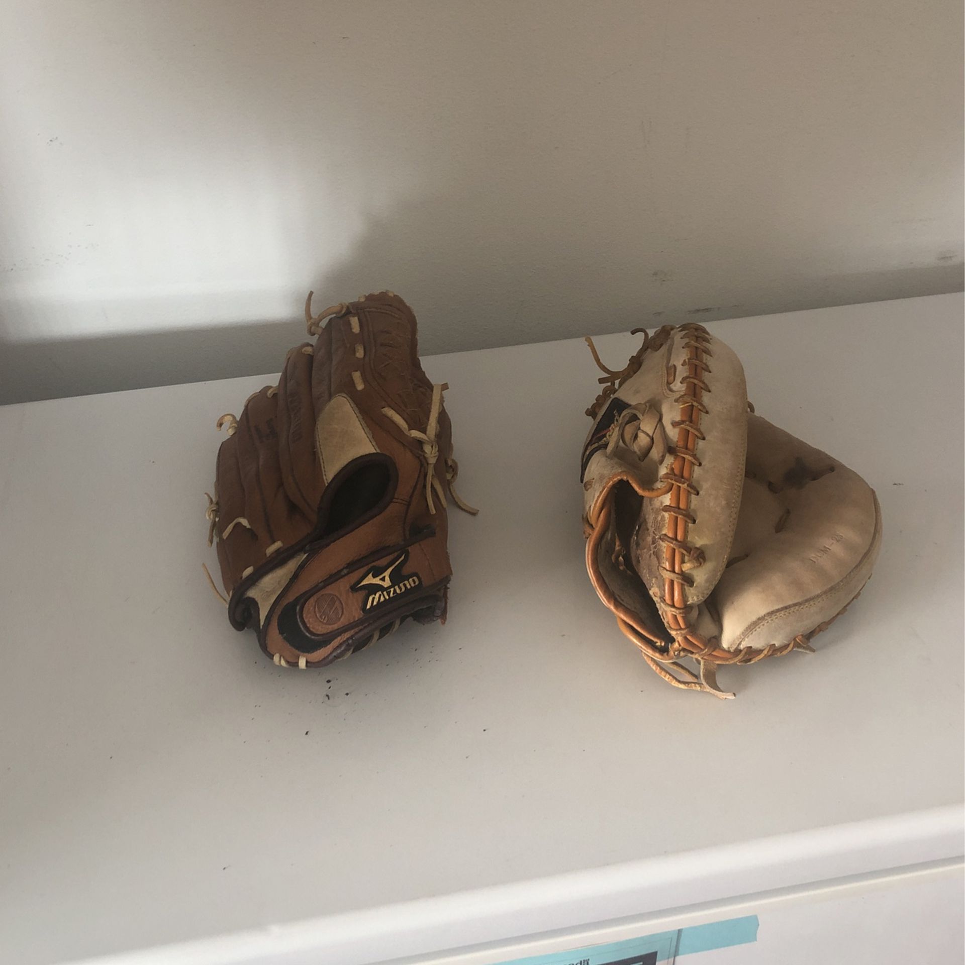 Two Leather Baseball Glove