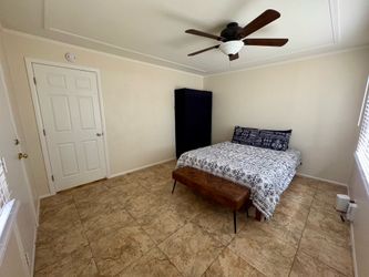 Slightly used queen bed frame and mattress.