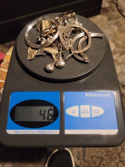 195g 9.25 Silver 6.3 TROY OZ, 1.6G 14KGold single earring with natural diamond $350 OBO