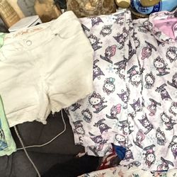 Preowned 6 pcs girls size 14/16 clothing . Hello kitty pjs are brand new. Others in good condition . Cat & Jack,jezbelroxii, hello kitty, ETC….located