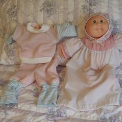 Cabbage patch doll with extra clothes