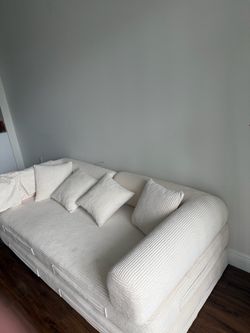 Beige pull out couch