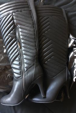 Never worn Torrid leather boots size 8w