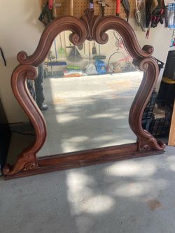 Large wood framed mirror