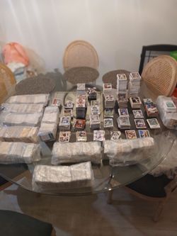 8000 Baseball/Football cards.