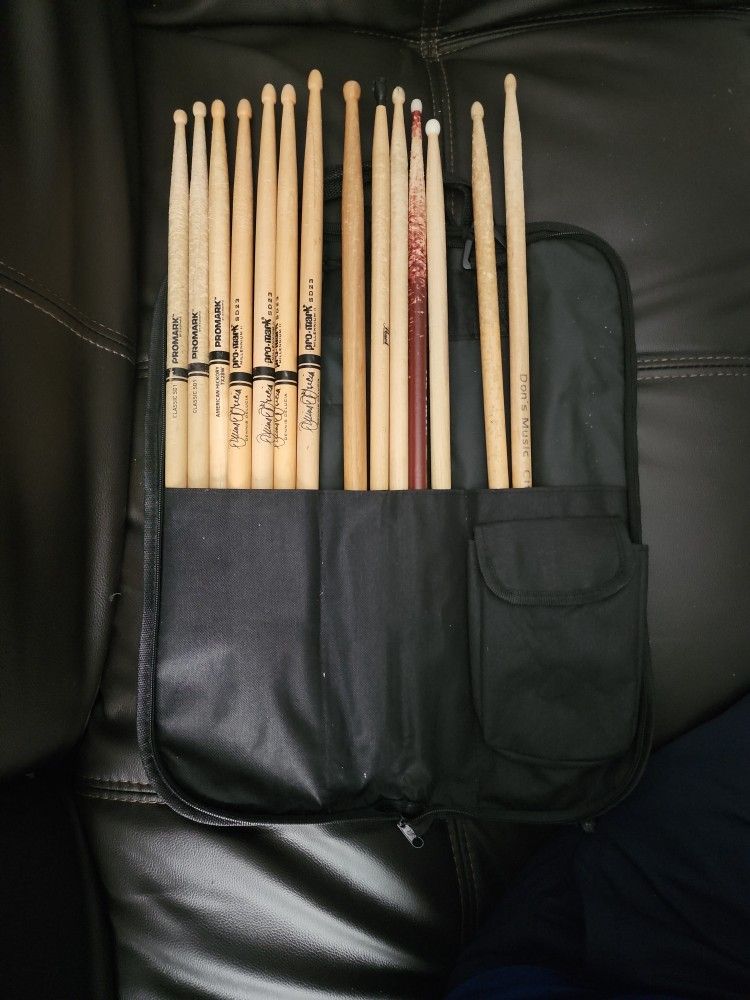 Chrome Cast Drum Sticks Bag and Various Sticks