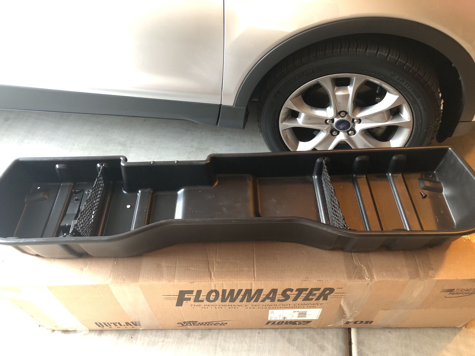 Crew Cab Underseat Storage Compartment in Black - GM (23183674)
