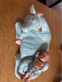 vintage porcelain Nativity ox with the Baby Jesus,