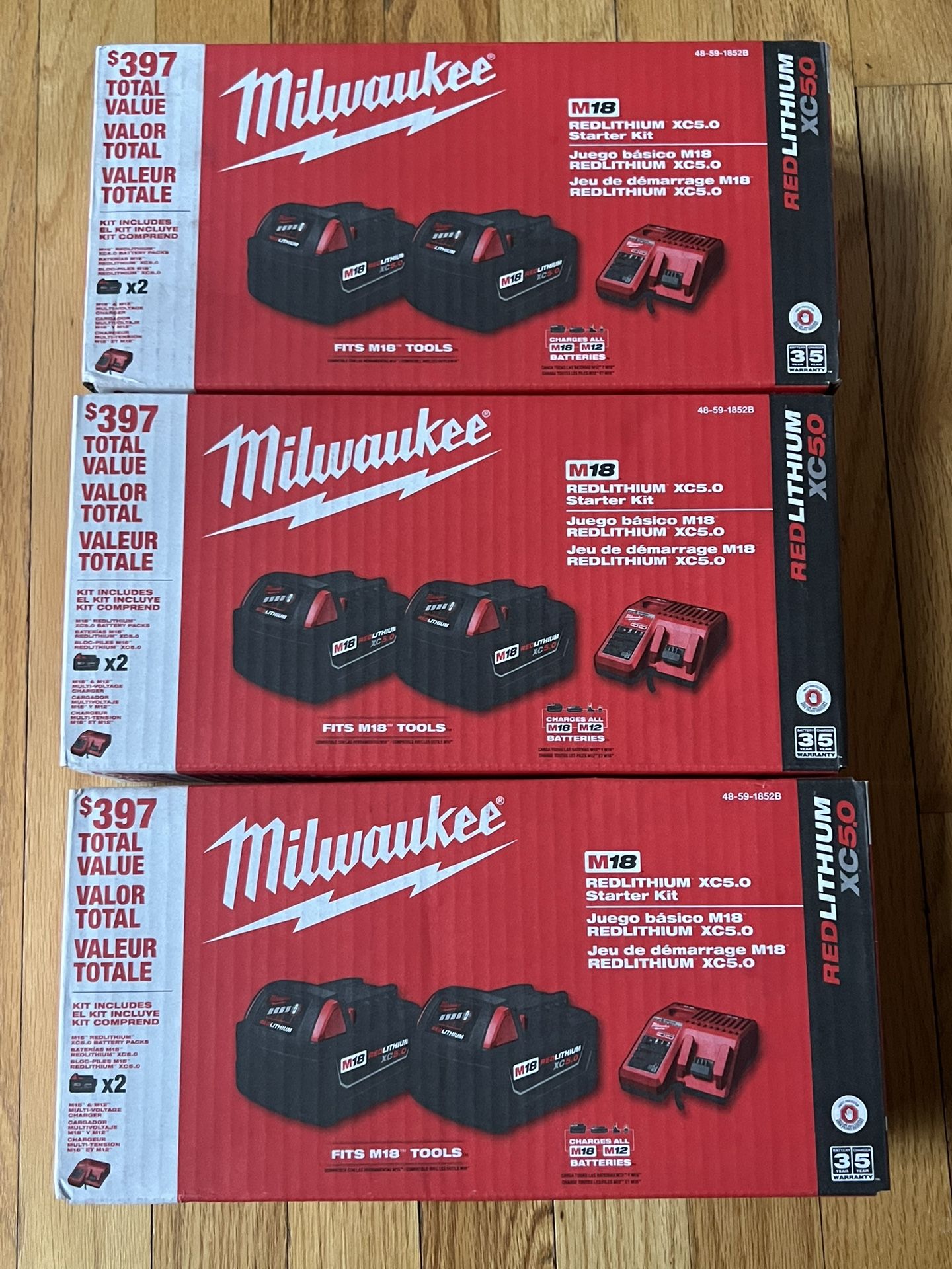 *NEW* Milwaukee M18 REDLITHIUM XC5.0Ah Starter Kit Including two 5.0 batteries & Charger - $150 Each