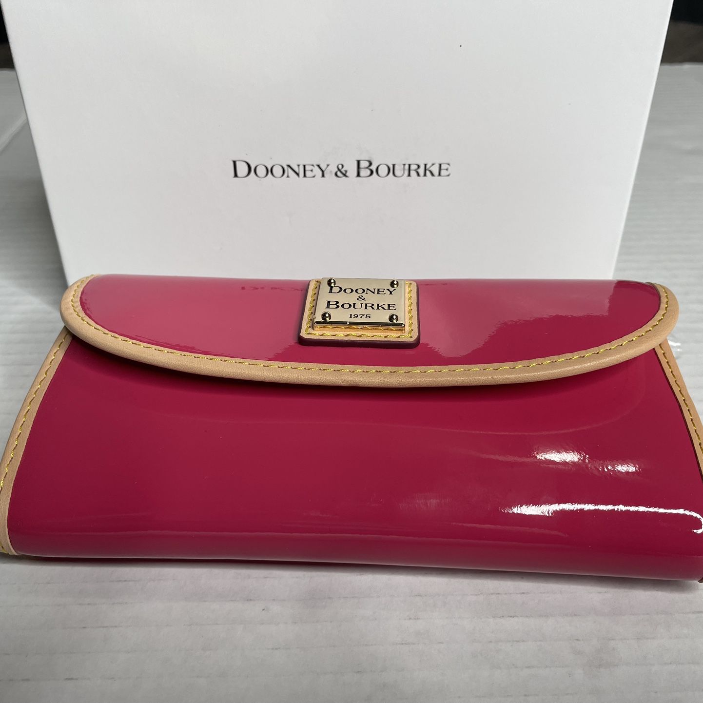 Dooney And Bourke Patent Continental Clutch