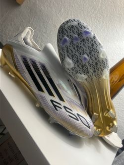 F50 ELITE LACELESS FIRM GROUND CLEATS