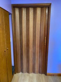 Smaller original Pella accordion door.