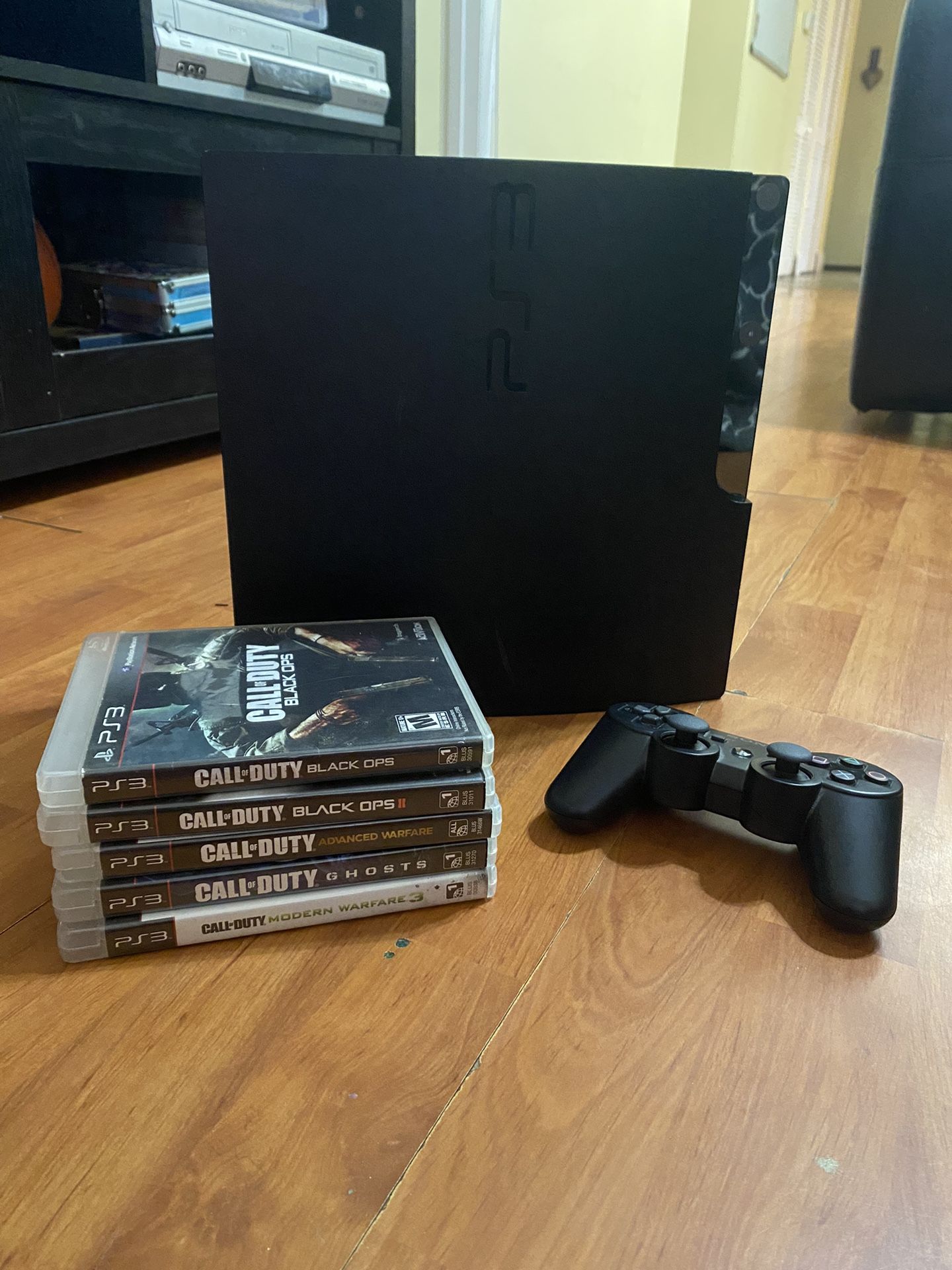 PS3 Slim 160GB with 5 Games