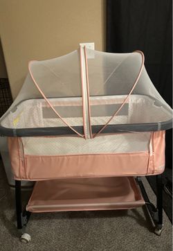 Pink baby basinet