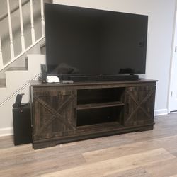 65 In. Roku With TV Stand Also With Sound bar