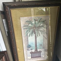 Double Set Of Janet Kruskamp presents a stunning 18x32 Gold Ornate Wood Framed With Double Matting Wall Art piece, entitled "Palm Tree in Basket I".