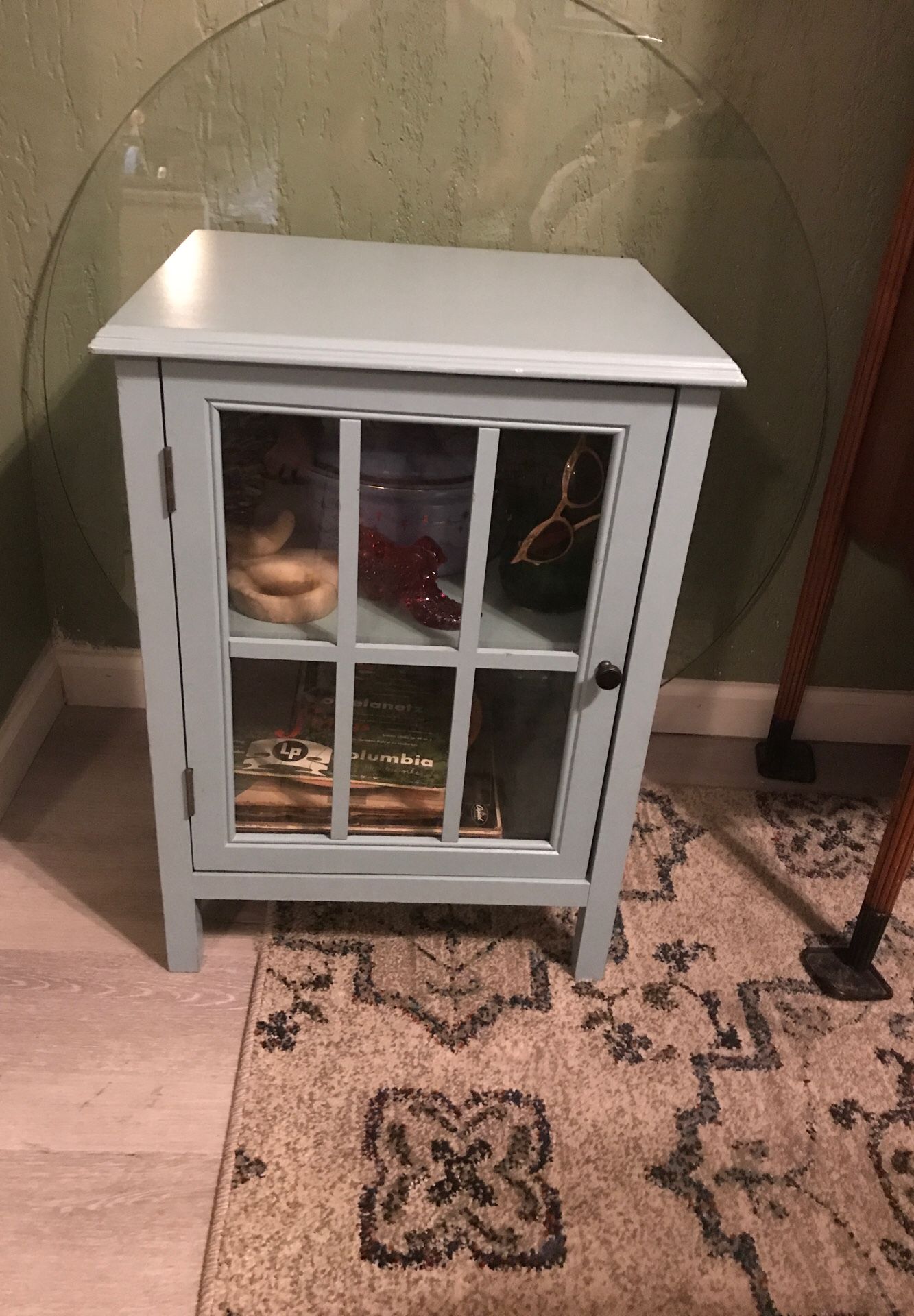 Light blue Glass door cabinet. Shelf inside end table. Nightstand