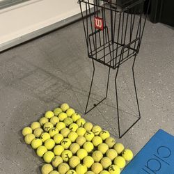 Tennis ball hopper with balls and rackets