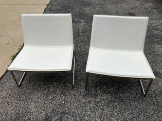 Modern CB2 white chairs