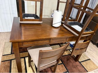 Dark wood table with drawers