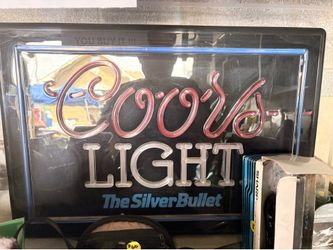 Neon coors  light and Schmitz  signs