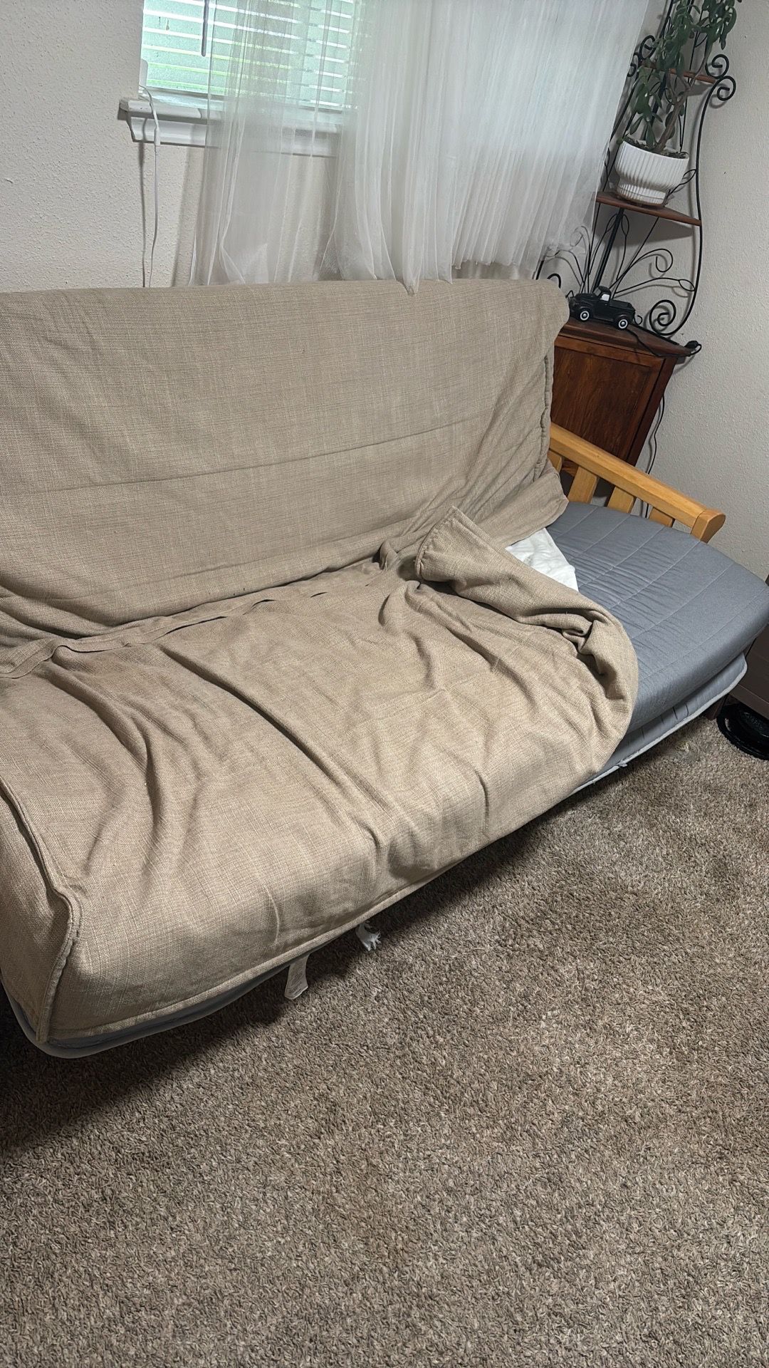 Futon with extra pad and protective cover